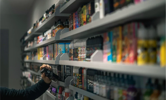 Vape e-liquids one a white shelf